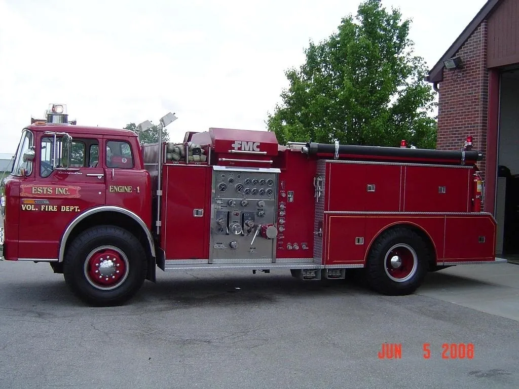 Red fire truck outside fire station