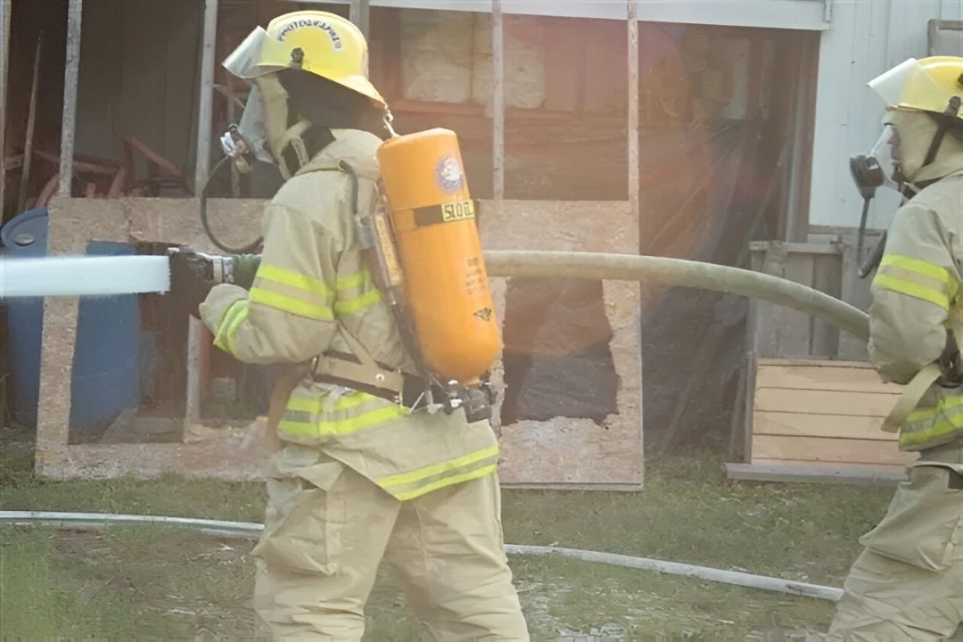 Firefighters wearing protective gear