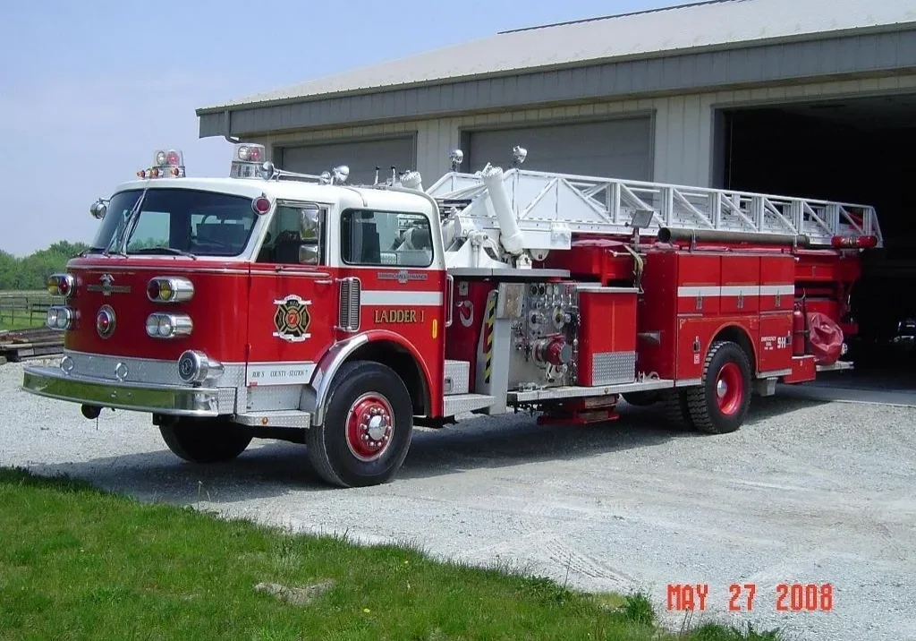 Classic fire engine with extended ladder